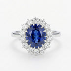 Ring with a blue gemstone and diamond-studded halo on a white background